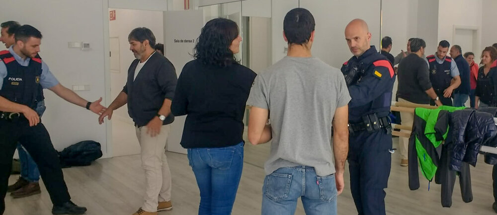 Assitents en un taller pràctic durant la formació